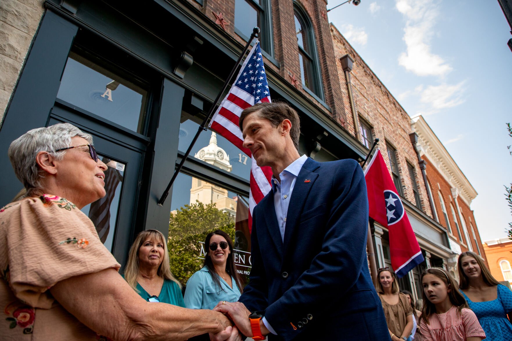 Chaz Molder shakes hands with a supporter
